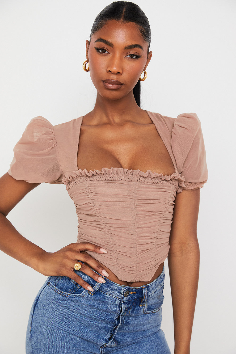 Corset en maille marron avec manches bouffantes et plis