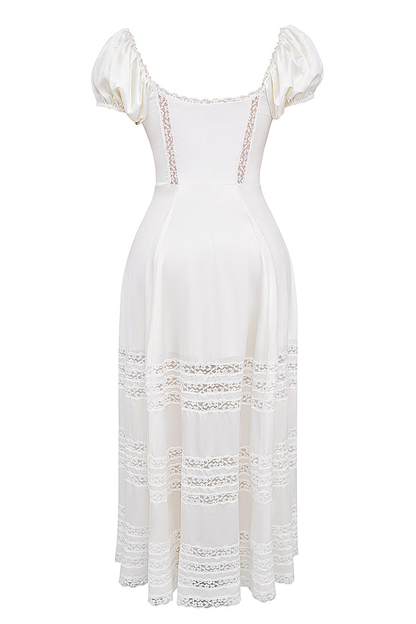 Robe de couleur ivoire en soie véritable avec manches bouffantes